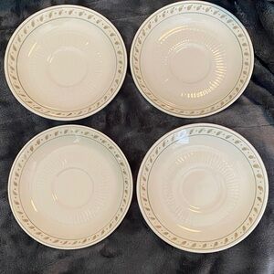 England Hand painted saucers.